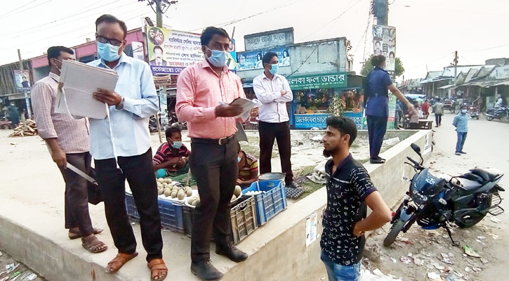 খোকসায় মাস্ক না পরায় ৫ জনকে জরিমানা