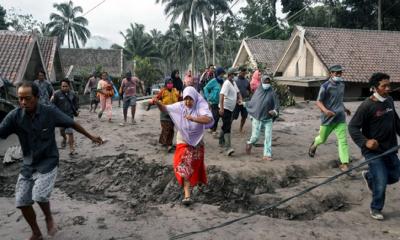 অগ্ন্যুৎপাত: ছাইয়ের নিচে তলিয়ে গেছে ১১ গ্রাম